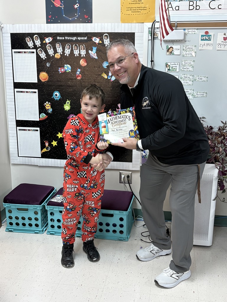 First Grader Axel McCollum math facts award presentation