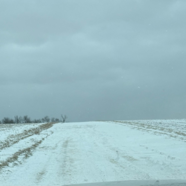 Another gravel road that is drifted closed.
