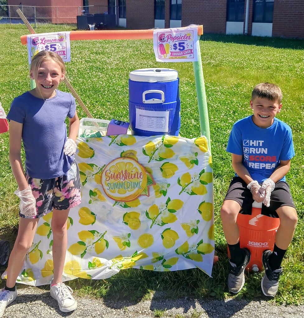 Showing off the lemonade stand