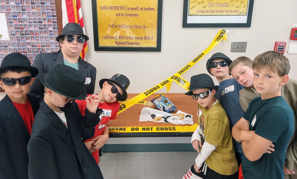 Student detectives at the scene of the stolen cookies