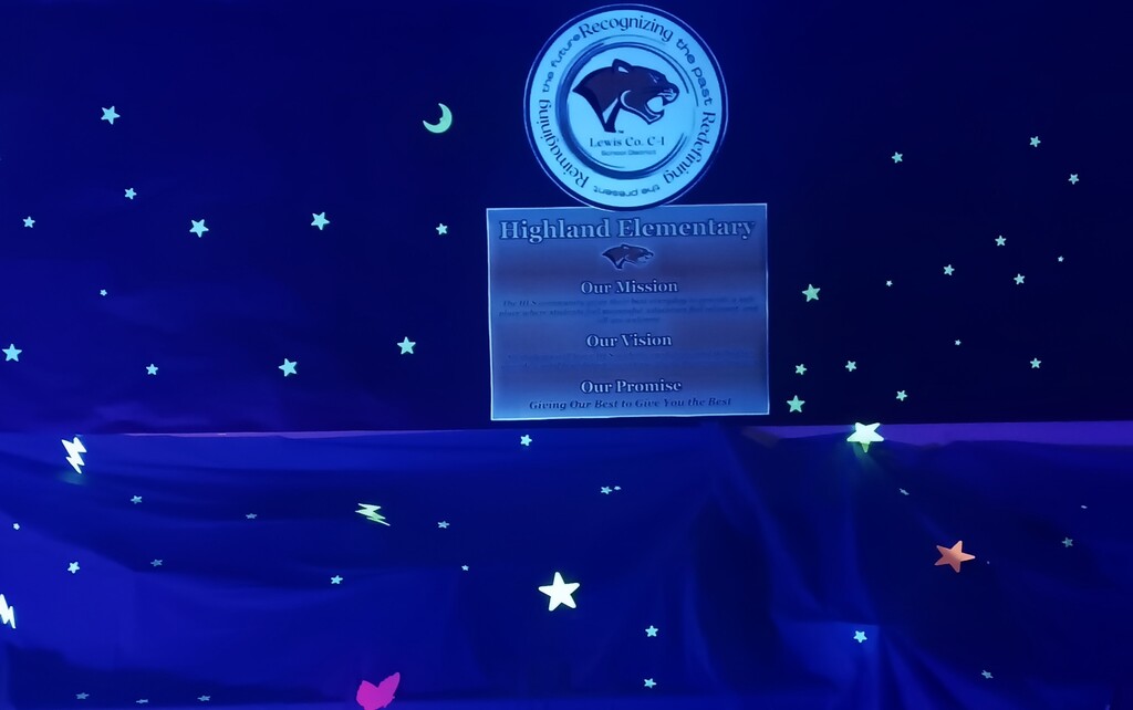 Glowing decorations on the school wall