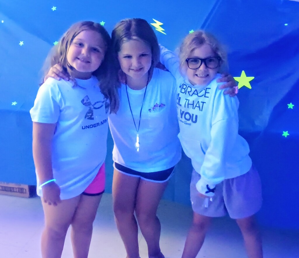 Three girls posing