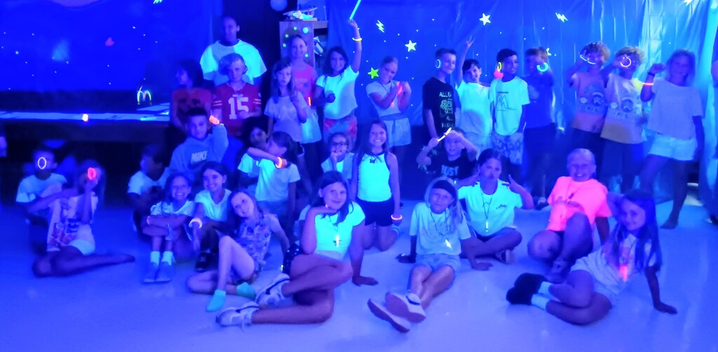 A group pic of glowing kids