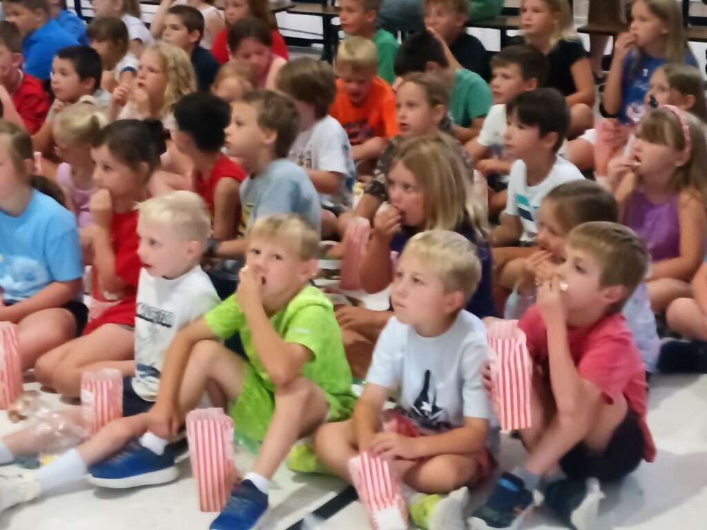 Young students watching the movie