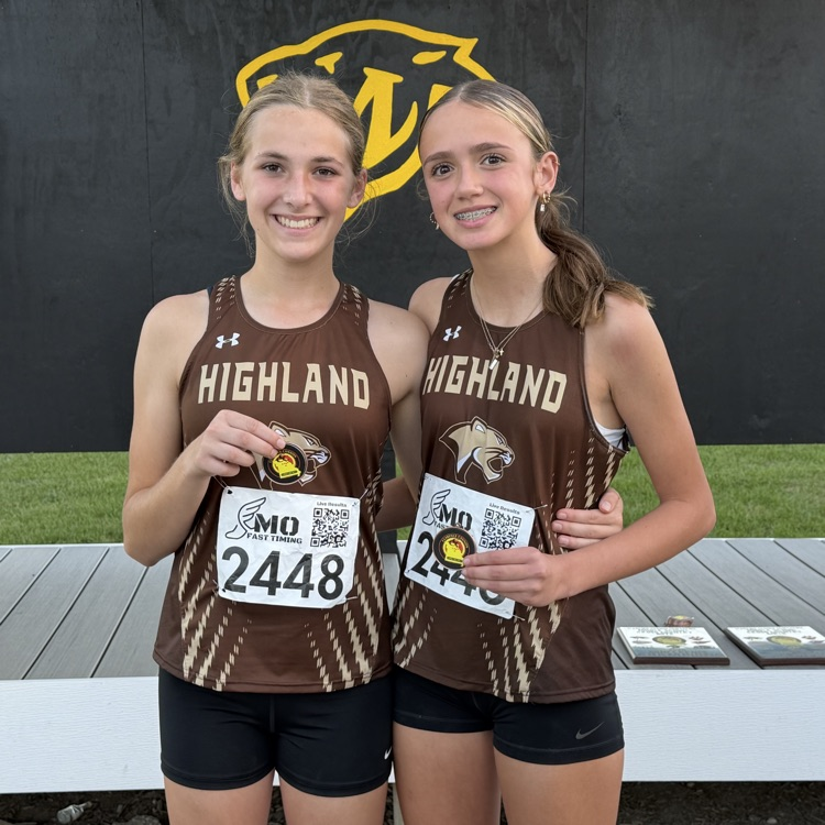 Natalie Wilson (8th) on the left and Jordyn Bringer (5th) on the right holding their CCC medals for finishing in the top 10!