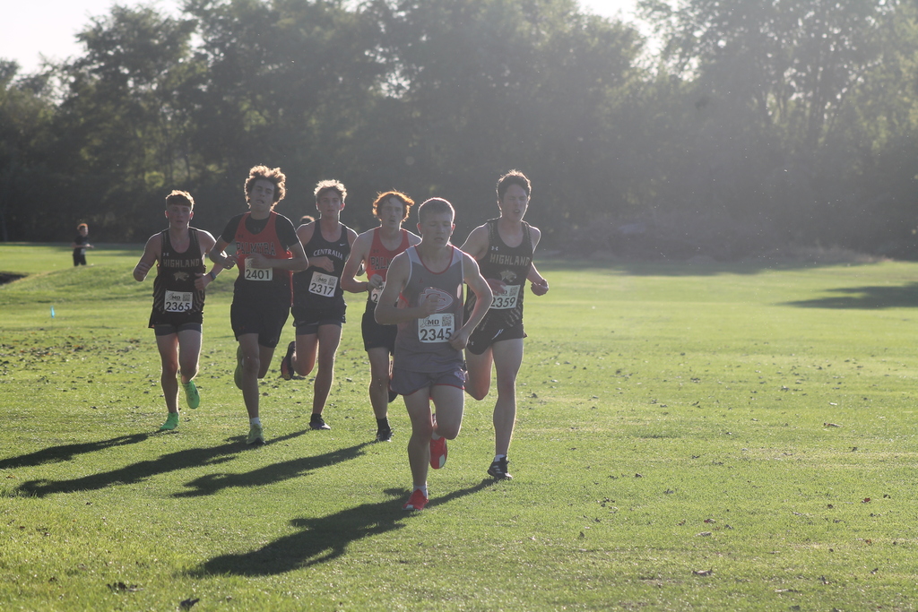 Cougars sophomore runners Logan Frieden and Connor Zulauf running with a pack of runners at the CCC Conference meet.