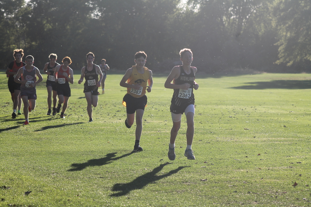 Aiden Martin leading a pack with Logan Frieden close behind.