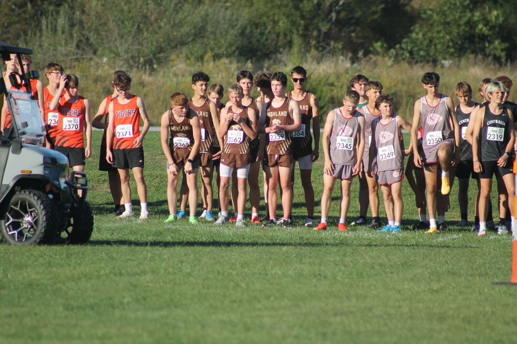 Image of the Highland HS Boy's runners for the Cougars XC team at the starting line of the CCC meet. Pictured from left to right: Connor Zulauf, Colton Lewis, Brayden Meredith, Aiden Martin, Evan Frieden, Walter Lay, Logan Frieden and Tyler Seals. 