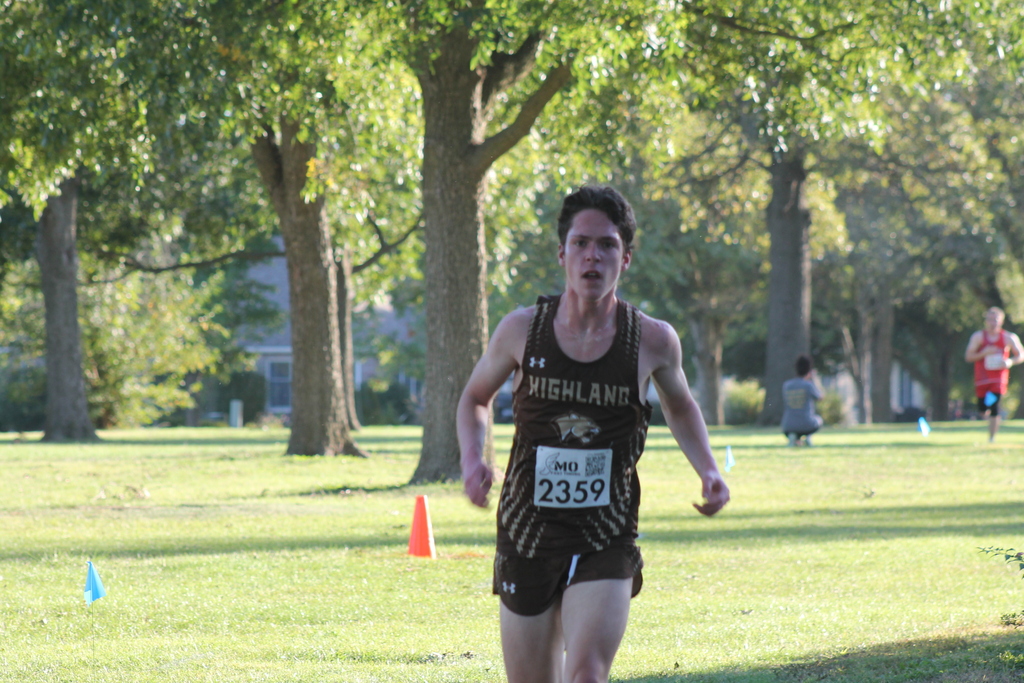 Logan Frieden (23rd overall finish) heading into the finish at the CCC XC meet.