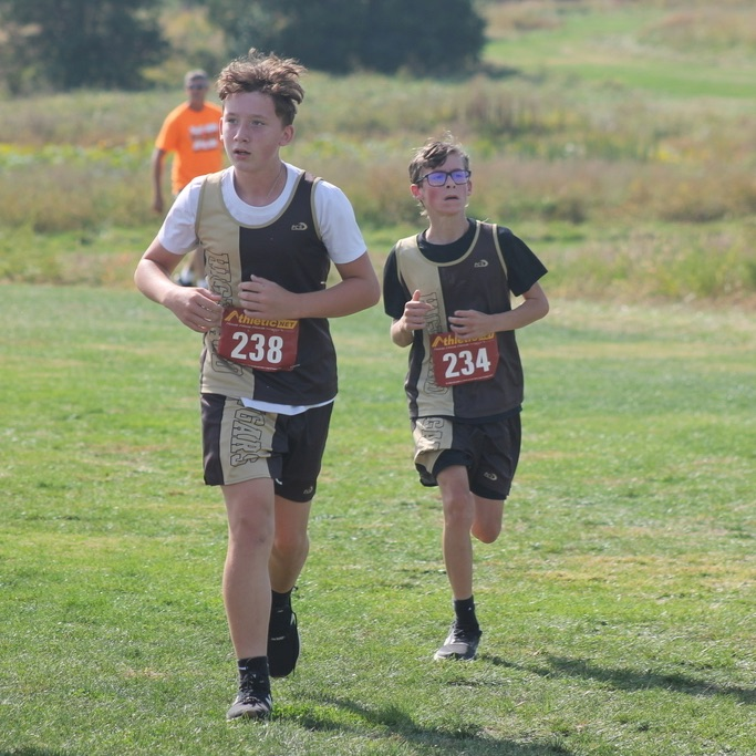 Jaxson Matson and Bentley Corrick heading into the finish at the Harrisburg meet.