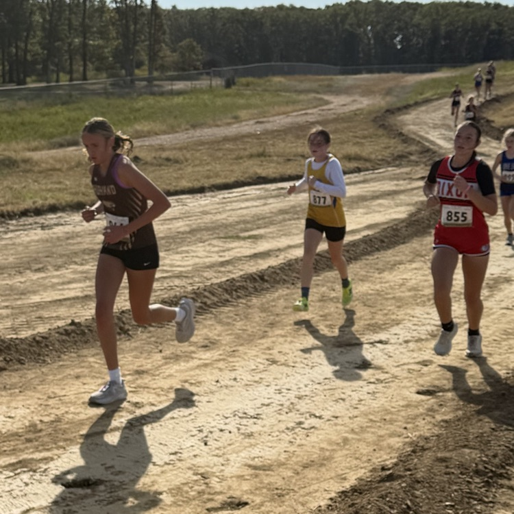 Jordyn Bringer heading into a big hill in the last mile of the course.