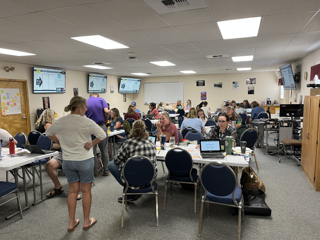 teachers sitting at the 15 day challenge
