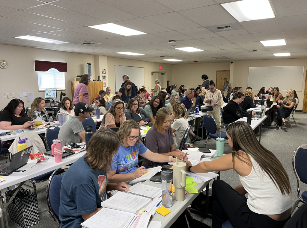 teachers sitting at the 15 day challenge