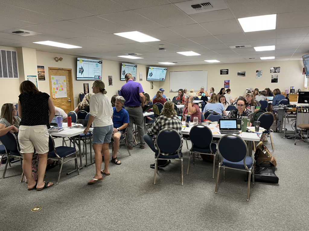 teachers sitting at the 15 day challenge