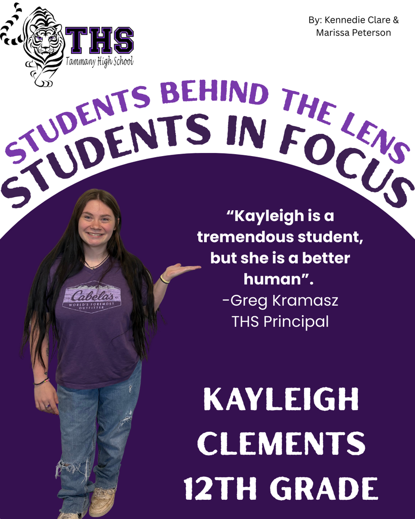 Kayleigh Clements in jeans and a purple shirt, she has brown hair