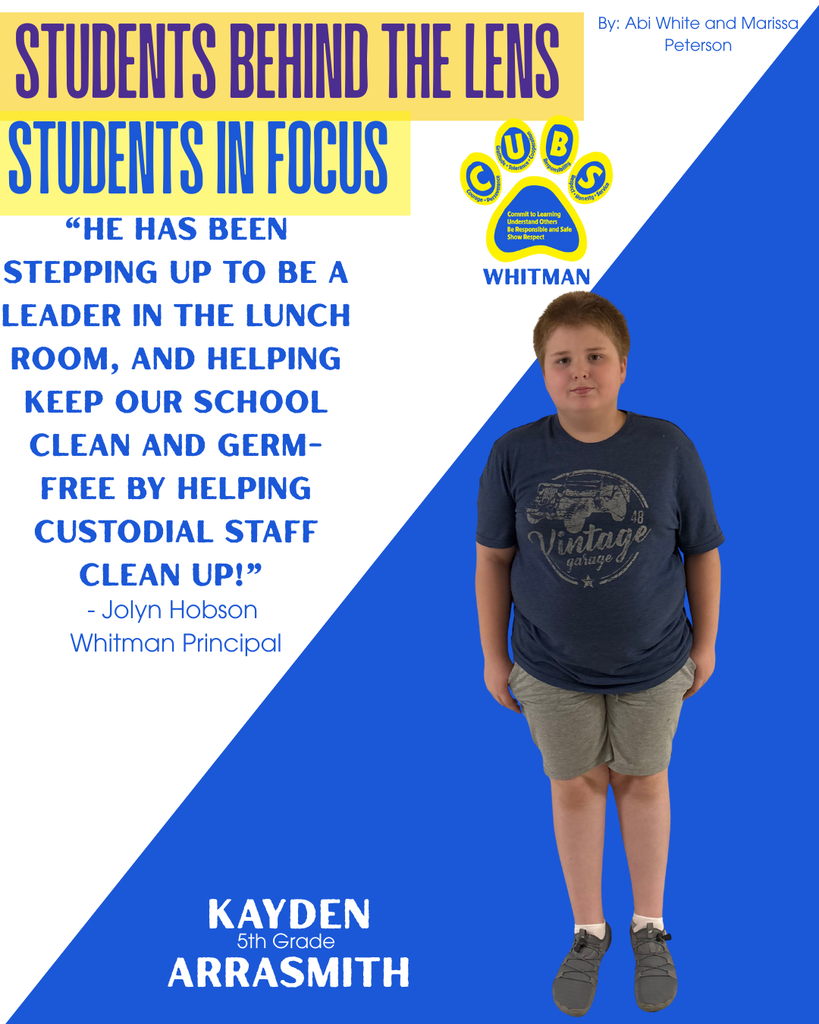 Kayden Arrasmith in a blue shirt and grey shorts