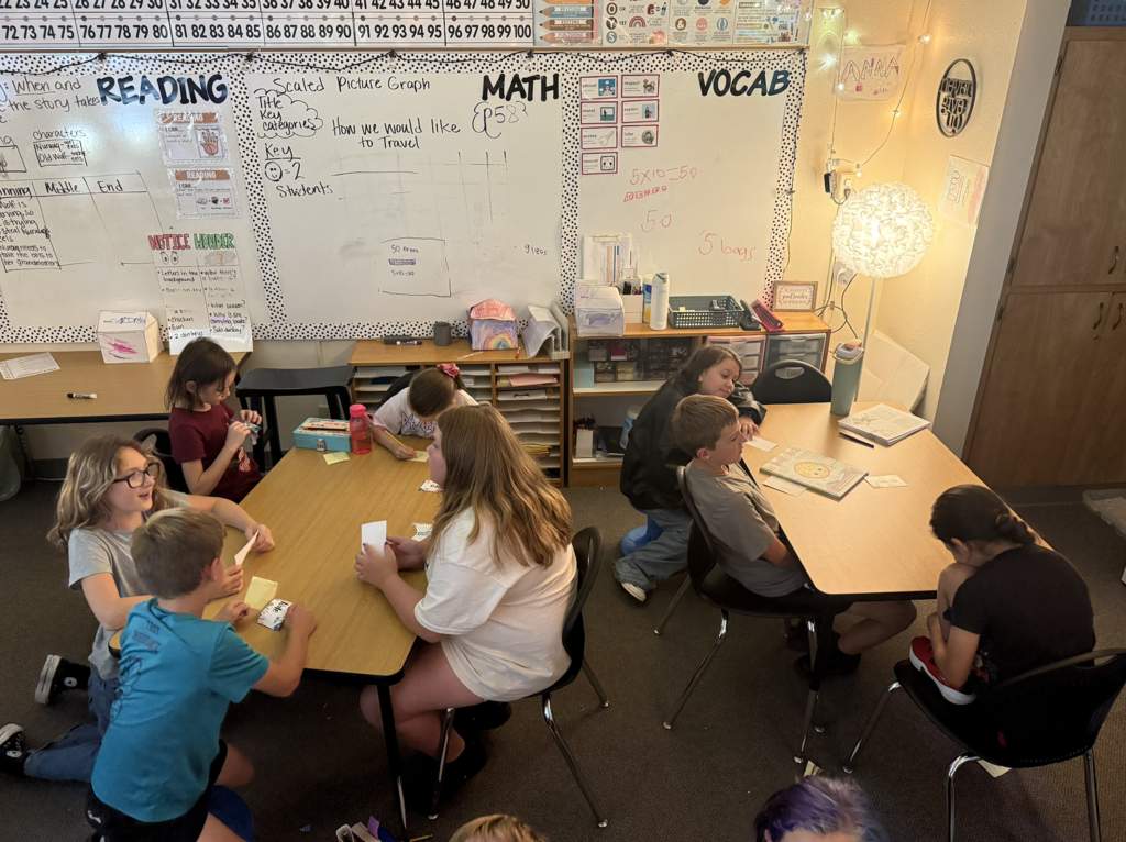 students working together at tables