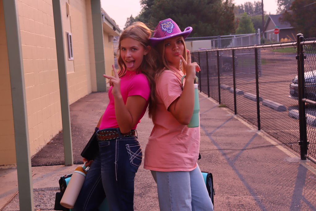 students wearing pink and western clothing