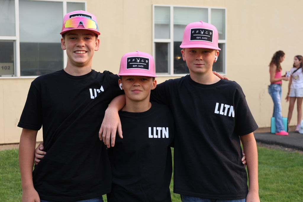 students wearing pink and western clothing