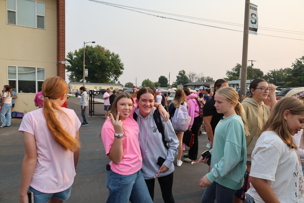 students wearing pink and western clothing