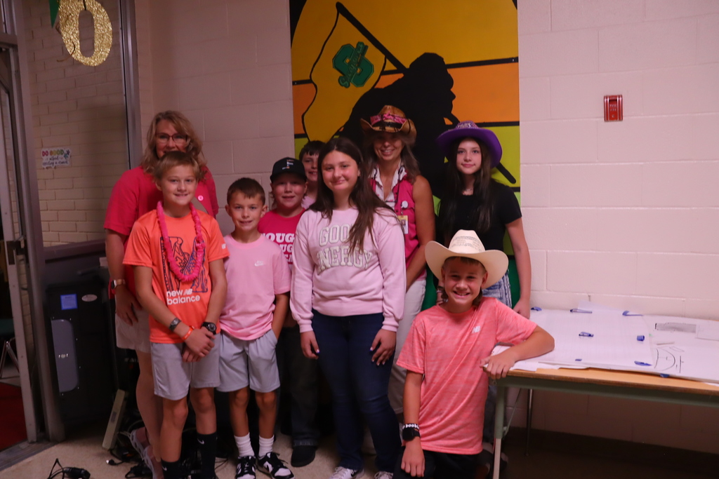 students wearing pink and western clothing