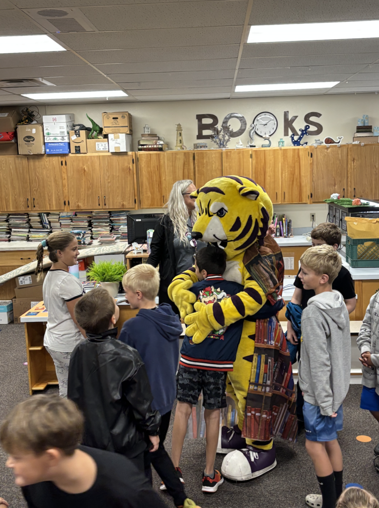 Joe Bengal hugging kids