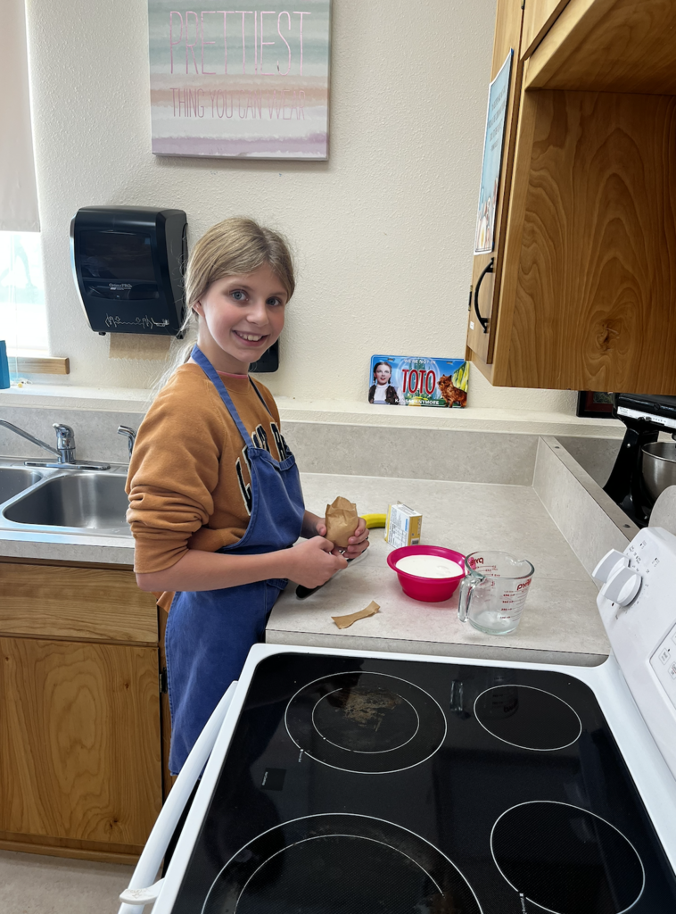 students slicing fruit