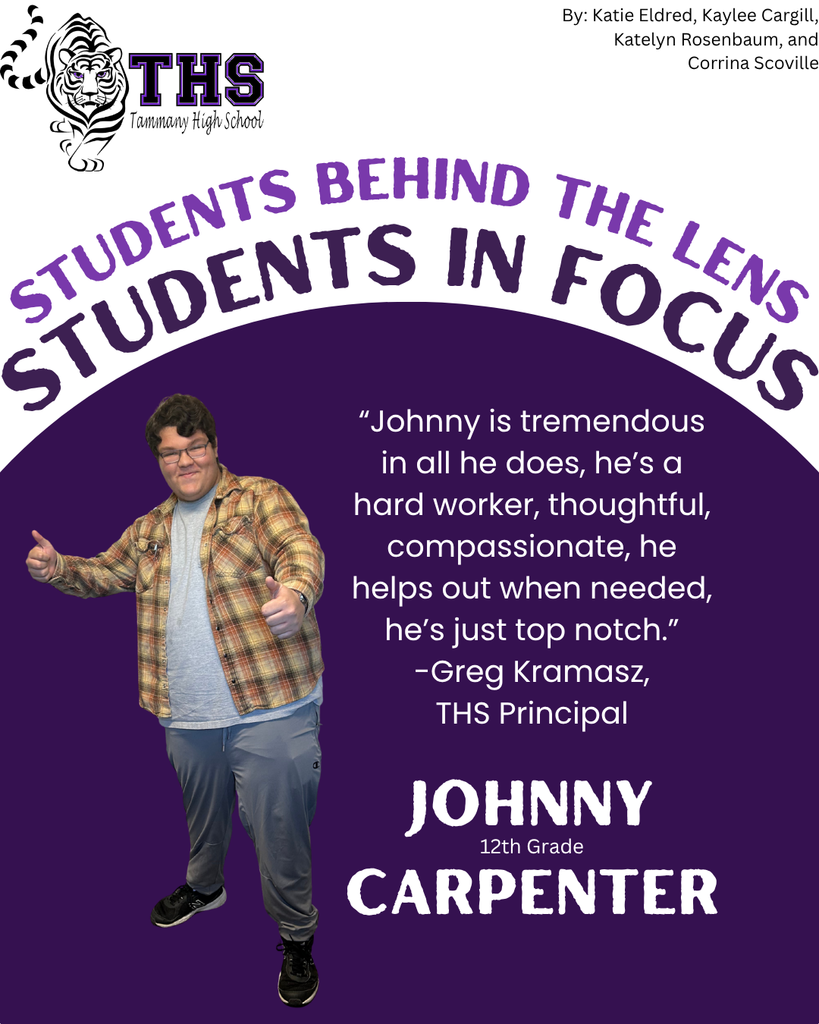 Johnny is swearing a flannel and grey pants