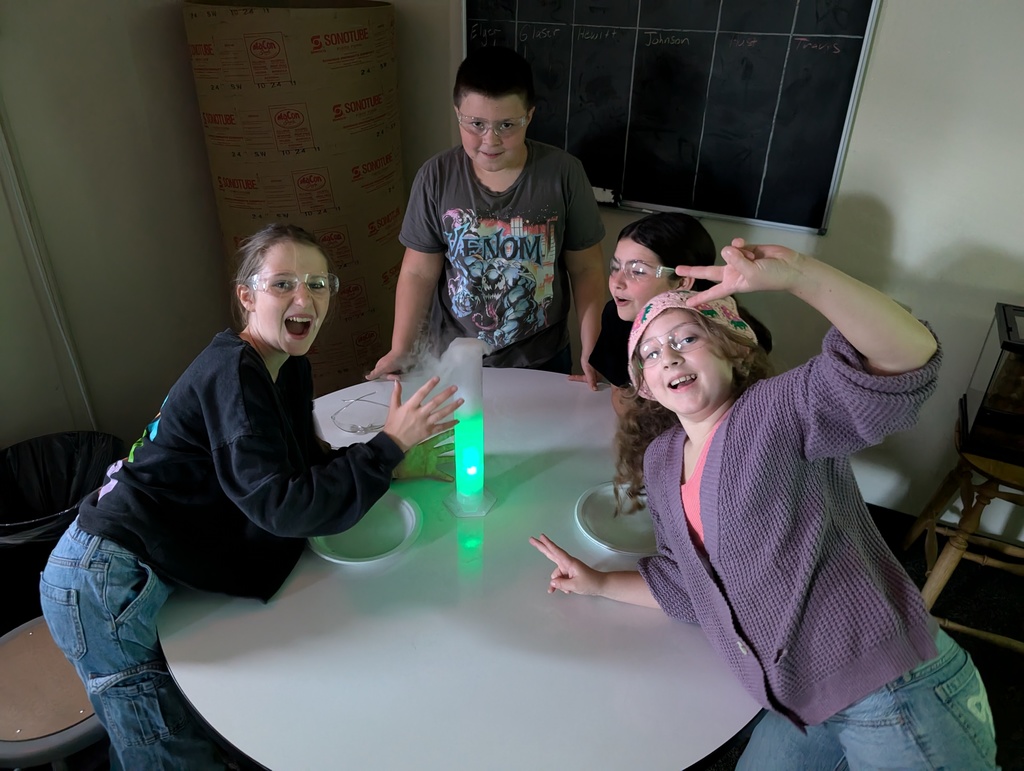 students doing an experiment with dry ice