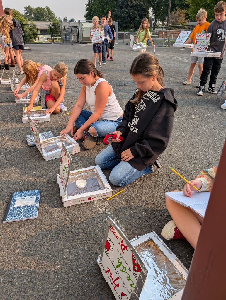 students making solar ovens