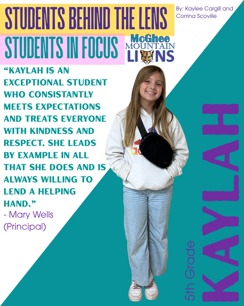 Kayla in jeans and a white hoodie