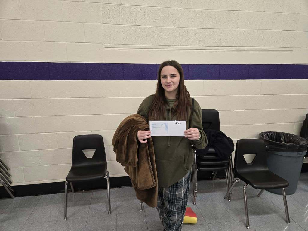 students posing with certificates