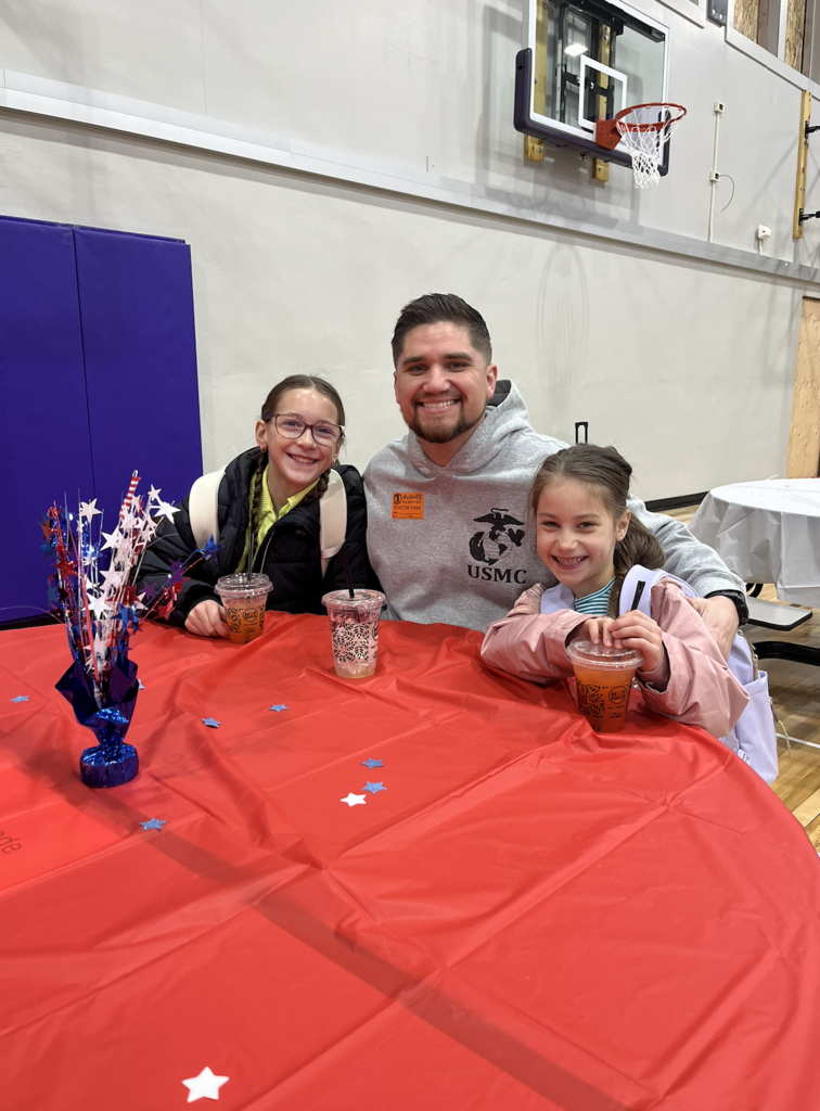 kids eating breakfast with veterans