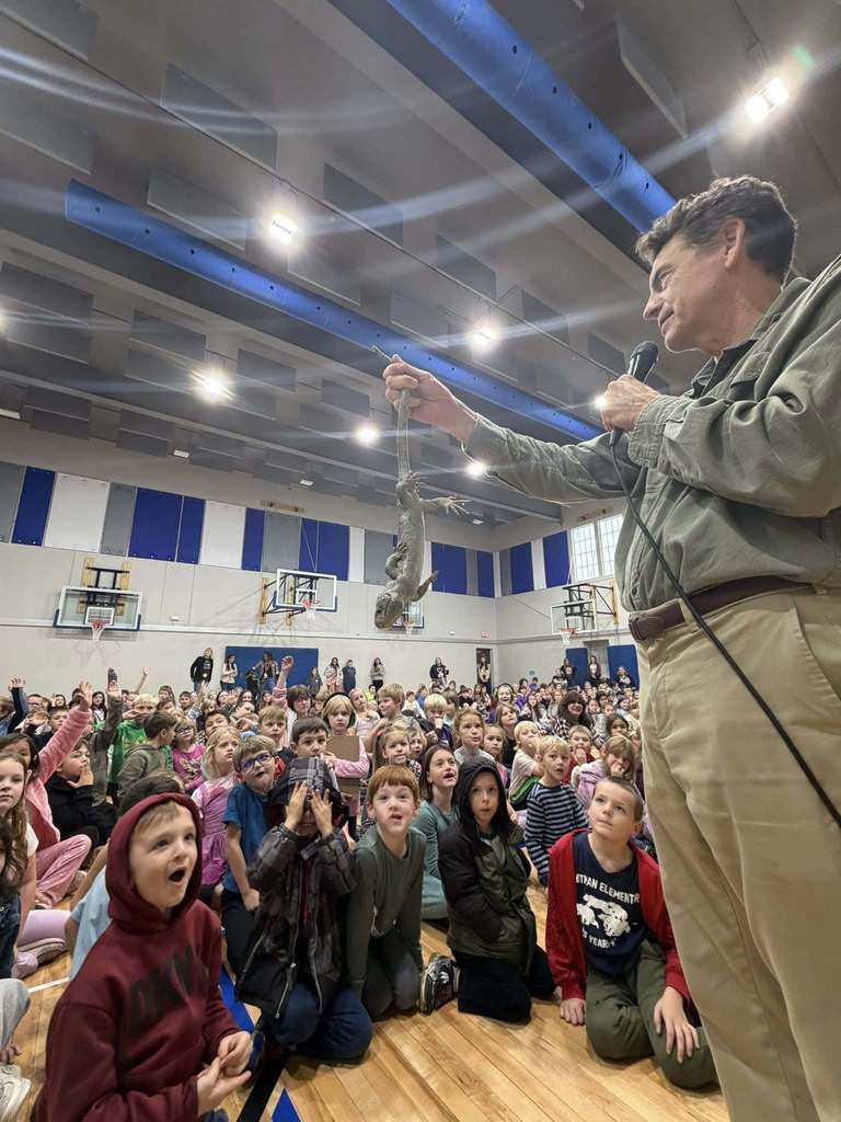 reptiles being shown to students