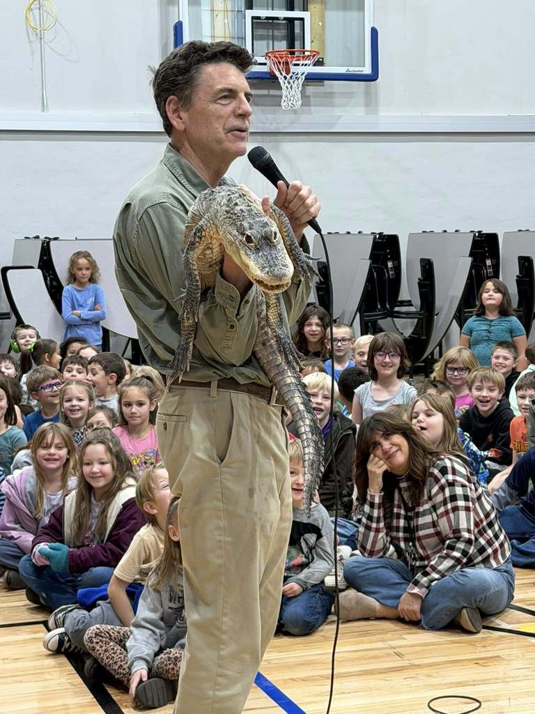 reptiles being shown to students