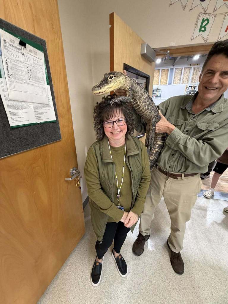 reptiles being shown to students