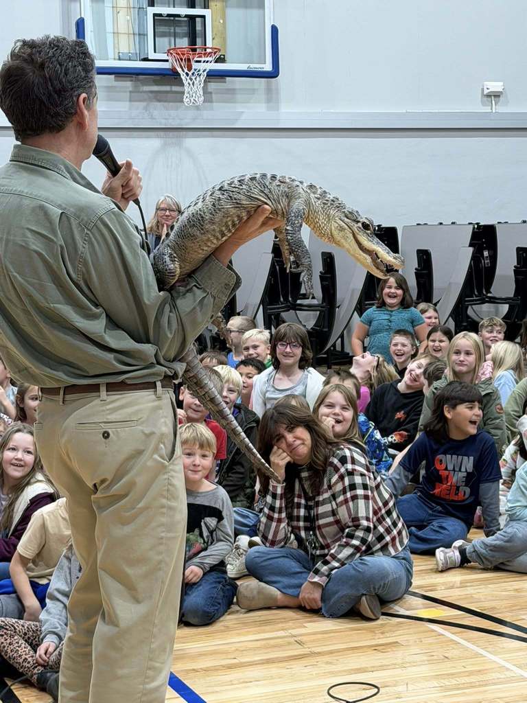 reptiles being shown to students