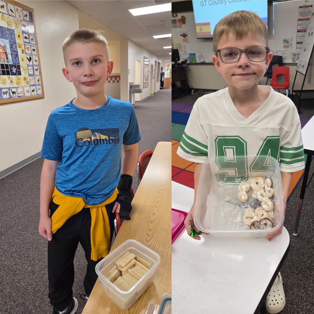 students with the dish they made