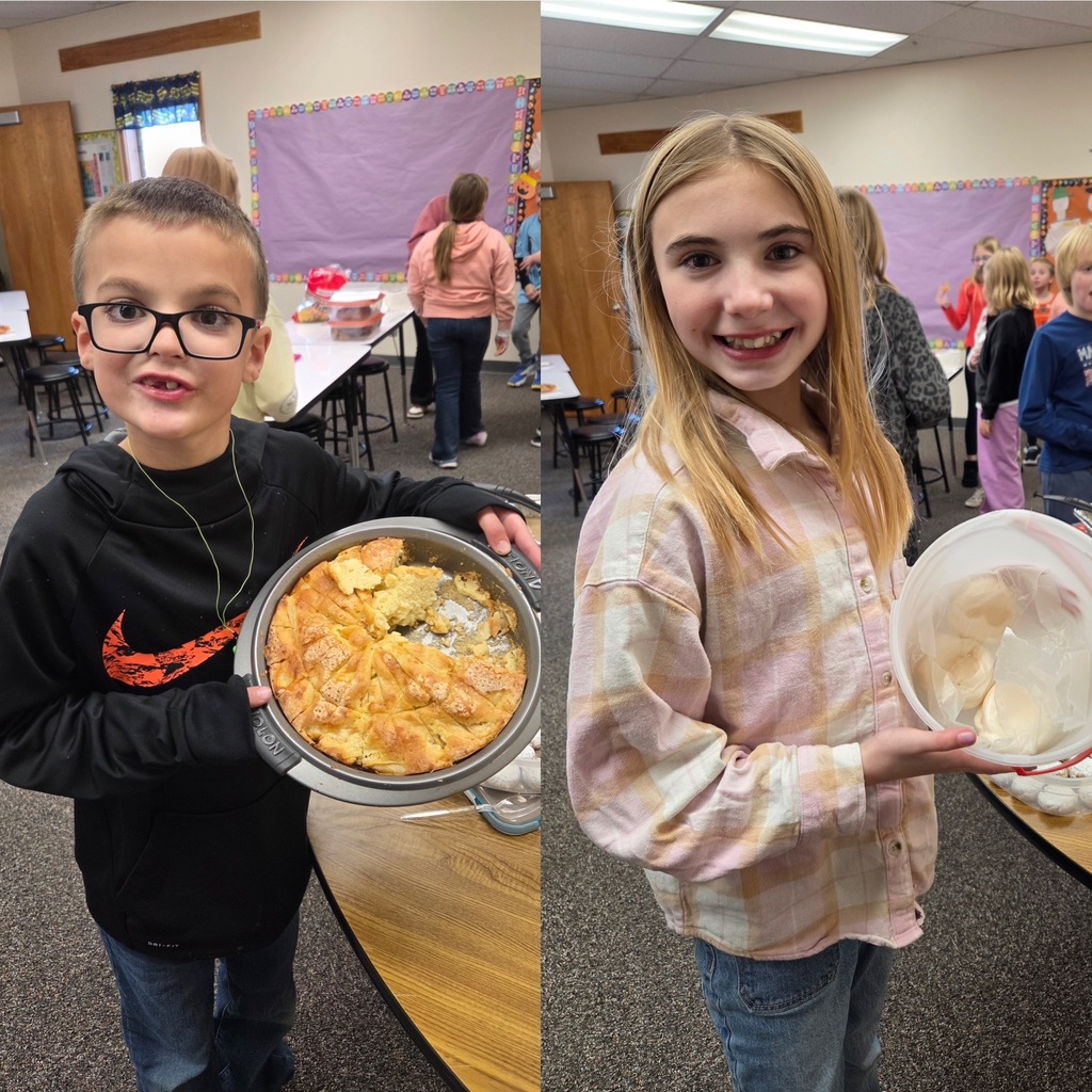students with the dish they made