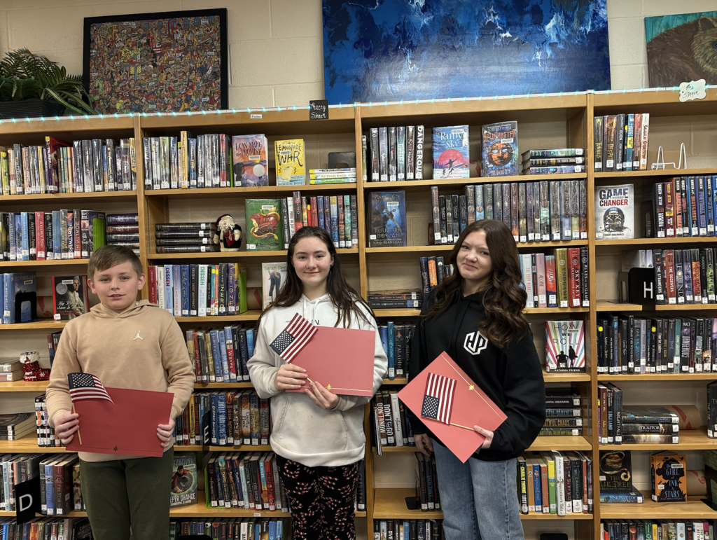 students receiving writing awards