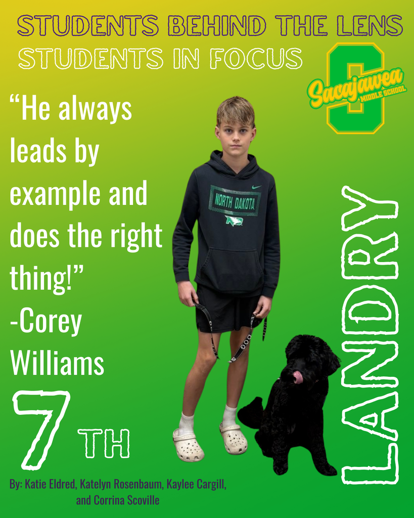 student in a black hoodie and black shorts with white crocs, holding a dog