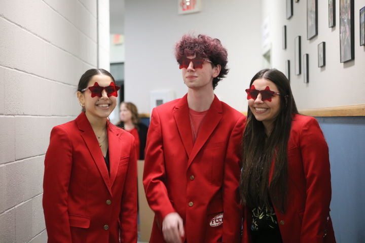3 students in red blazers
