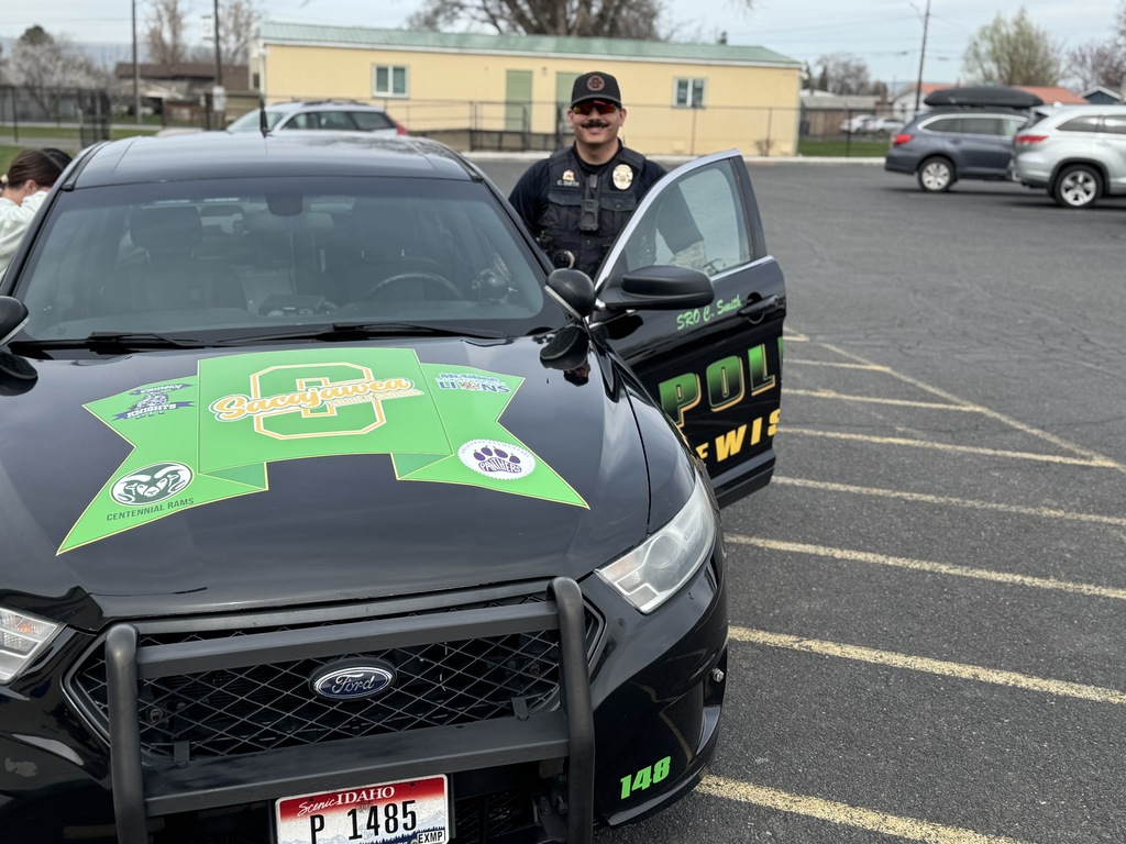Officer Smith opening the police car door