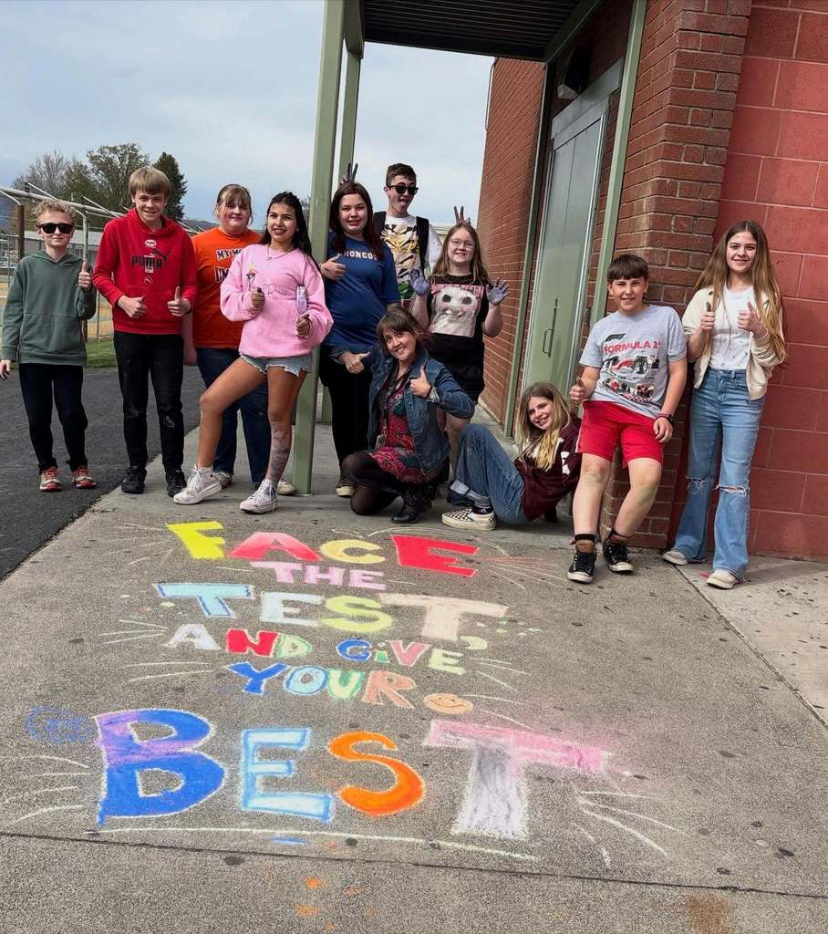 art club students with their sidewalk chalk art