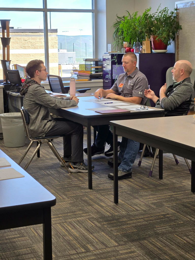 students participating in mock interviews