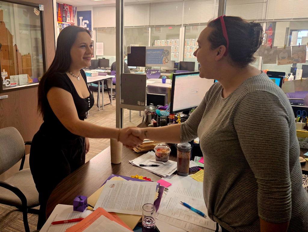 students participating in mock interviews
