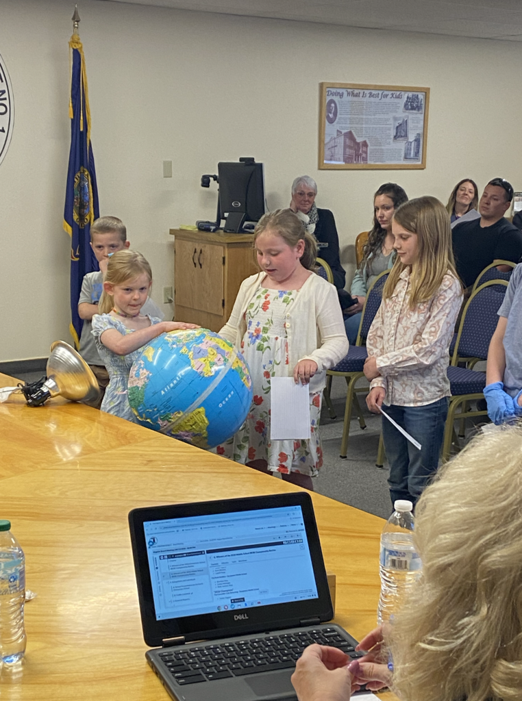 STEM students presenting to the school board