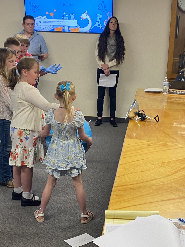STEM students presenting to the school board