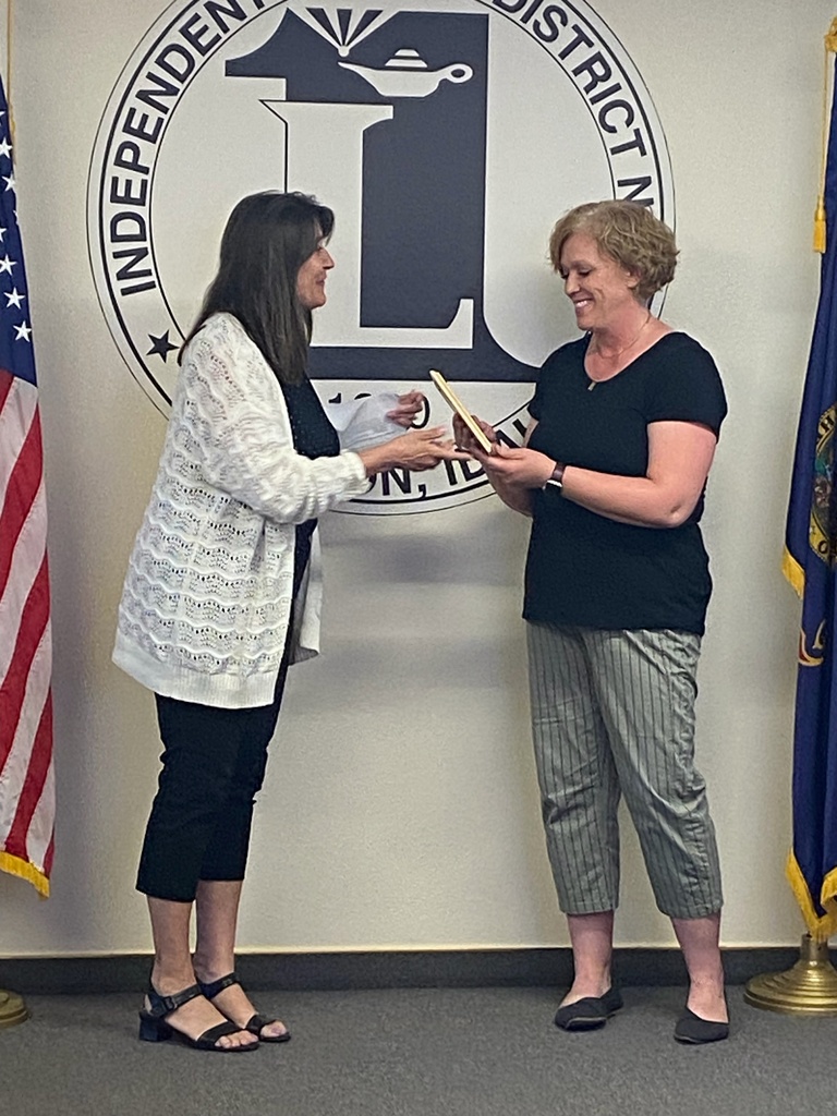 Deedra receiving her award