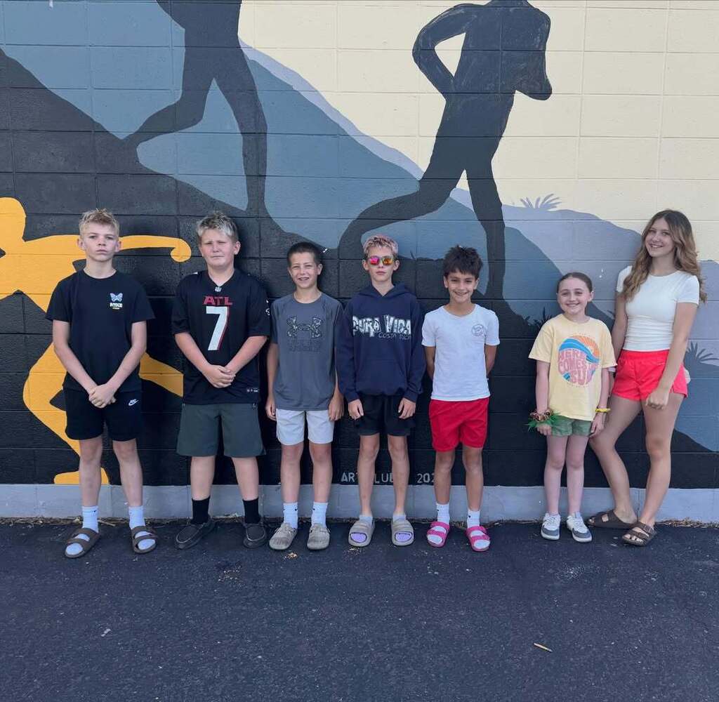 7 students standing together
